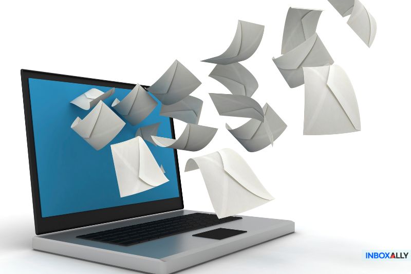 IMAP vs SMTP: Digital envelopes flying from a laptop screen, representing email retrieval (IMAP) and outgoing email transmission (SMTP).