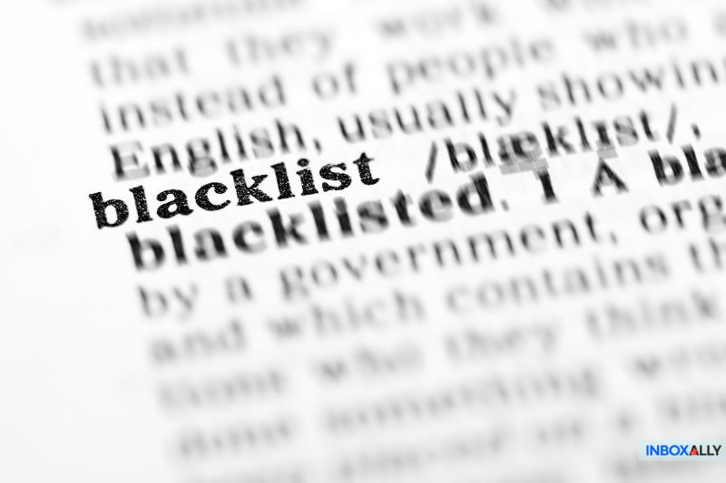 Close-up of the word "blacklist" in a dictionary, representing email blocking issues related to the RATS-Dyna blacklist.